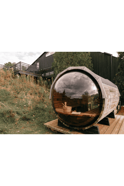 i love the look of these outdoor barrel saunas