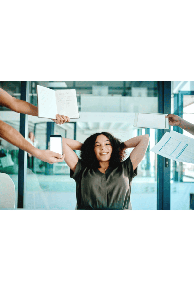 woman looking happy in high pressure work situation. 