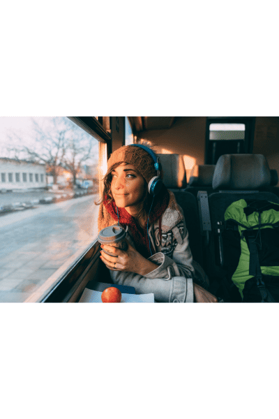 woman on wellness journey in train