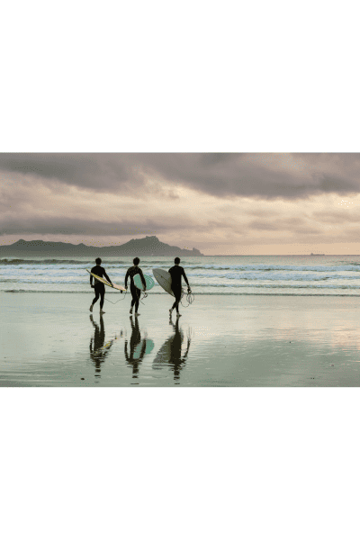 group of people about to go surfing
