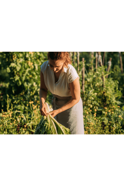 Women gardening - doing her part to achieve environmental wellness