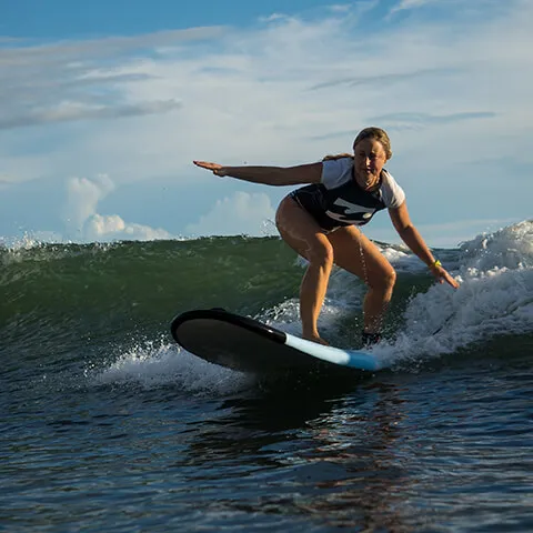 beginner surfer at surf retreat costa rica